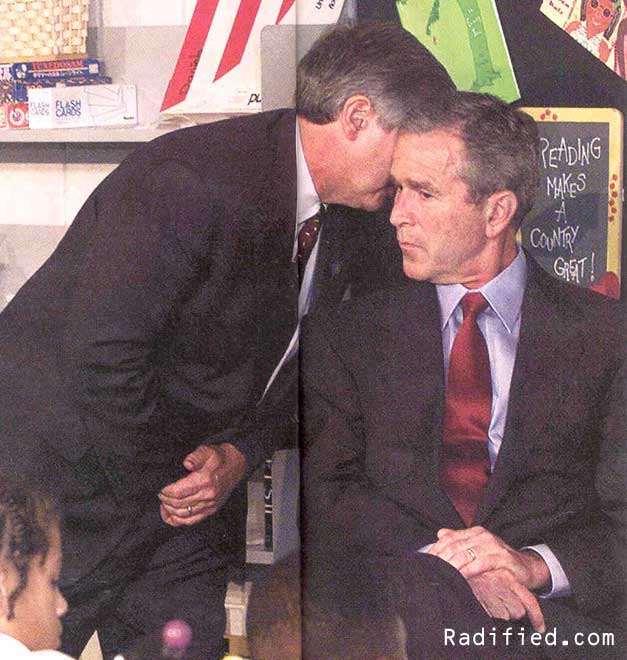 September 11, 2001. Chief of Staff Andrew Card whispers the news to President Bush in Sarasota, Florida.