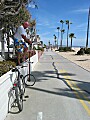 Eric prepares to mount his unicycle at the strand, Balboa Peninsula, Newport Beach, California