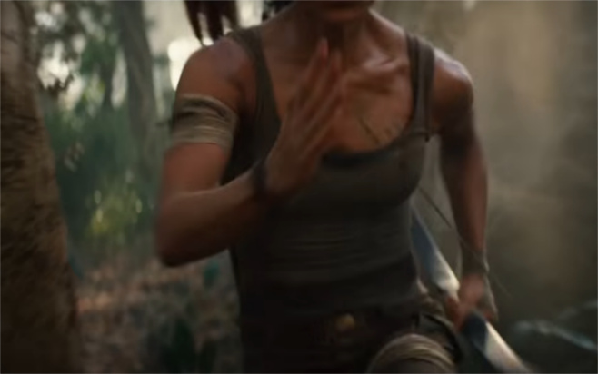 Sweaty Tomb Raider Lara Croft running thru jungle with bow in hand