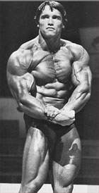 Arnold Posing to Display his Muscles