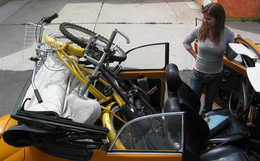 Bikes in the back seat of the bug