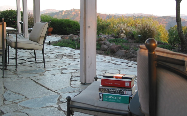 New digs, Back patio, Rad chair & books, Facing Palomar mountans at sunset
