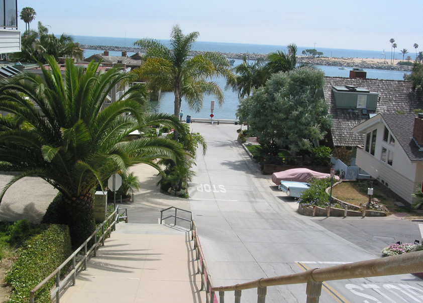 Sitting on the Steps to China Cove in Corona del Mar, Newport Beach, California