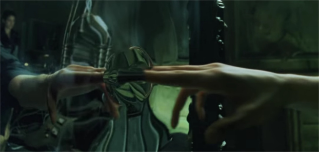 Neo touches the mirror in The Matrix